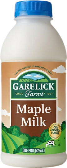 A bottle of Garelick Farms Maple Milk: blue cap, brown label reading Maple Milk over a green field with a grazing cow, marked ONE PINT (473 mL).